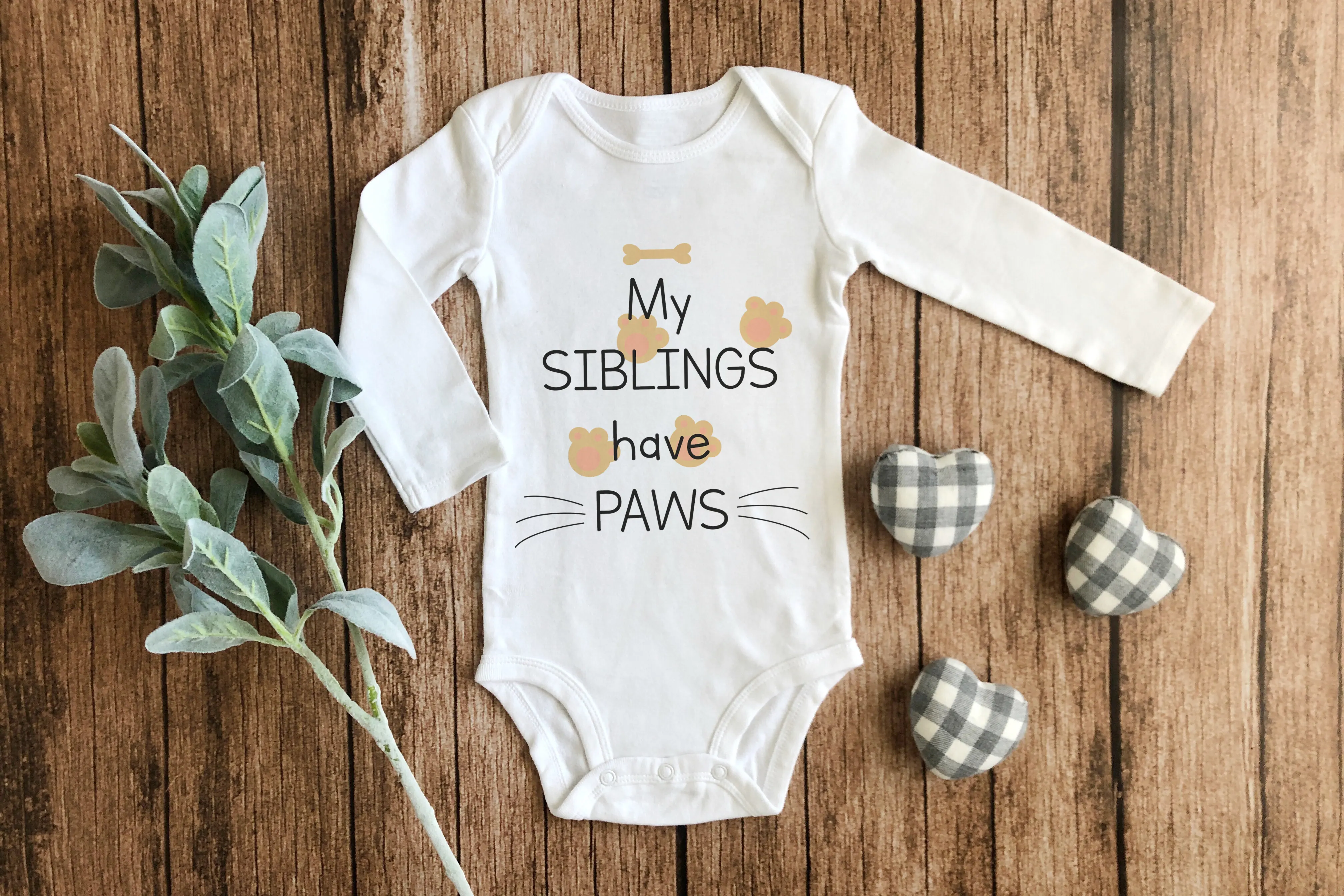 My siblings have paws | bedruckter Babybody